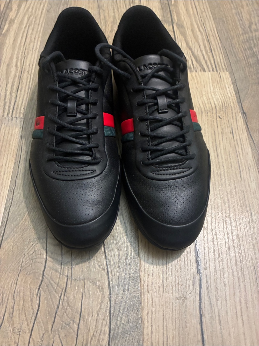 Lacoste Black Leather Sneakers with Red and Green Stripes